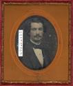 [Young man with a beard]