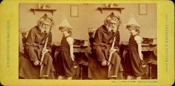 [Man whittling sword for child]
