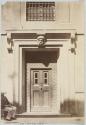 [Doorway with seated doorman]]