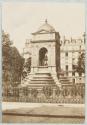 [Fountain under domed arch]