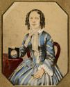 [Woman holding child's portrait and pansy]