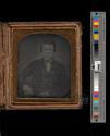[Portrait of a man with striped bow tie]