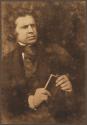 [David Octavius Hill holding book]