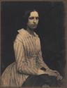 [Woman in striped dress]