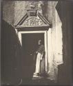 [Woman standing in doorway of Acheson House at Canongate]