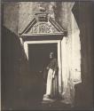 [Woman standing in doorway of Acheson House at Canongate]
