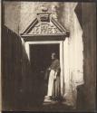 [Woman standing in doorway of Acheson House at Canongate]