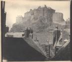 [Edinburgh Castle over the rooftops of the Grassmarket]