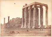[Olympieion from the southeast with the Acropolis in the distance]