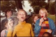 Boy in Yellow Shirt Smoking