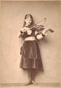 [Xie Kitchin with violin]