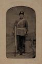 [Standing young man in uniform]