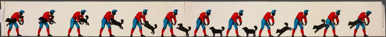 [Dog jumping through man's arms]
