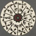 [Black windmill turning wheel which moves gear]