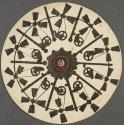 [Black windmill turning wheel which moves gear]