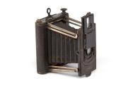 Murer strut folding plate camera