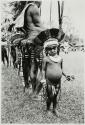 [New Guinean boy in traditional dress]