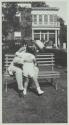George Eastman hugging George Eastman Dryden Jr. at the Dryden home in Evanston, Illinois