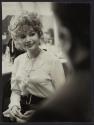 [Female performer with curly hair backstage at El Morocco nightclub]