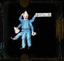 [Clown holding sign]