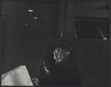 [Woman holding a bag]