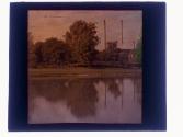[View of water and smoke stacks]