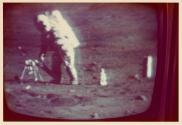 [TV showing Apollo 16 broadcast]