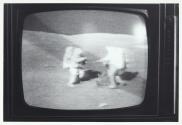 [TV showing Apollo 16 broadcast]