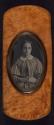 [Tobacco box (woman)]