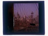 New York City Through Wires of Bridge