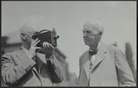 George Eastman demonstrating movie camera to Thomas Edison