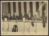 George Eastman and others at banquet table
