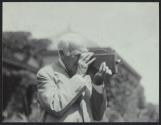 Thomas Edison with camera at Kodacolor Party
