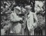 George Eastman showing Thomas Edison a Cine Kodak Model B