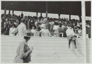 George Eastman seated in a viewing stand