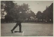 George Eastman pitching a baseball