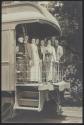 George Eastman and companions near train, California Trip