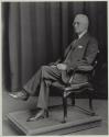George Eastman seated in chair