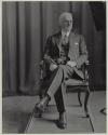 George Eastman seated in chair