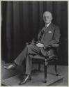 George Eastman seated in chair
