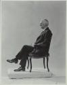 George Eastman seated in chair