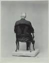 George Eastman seated in chair