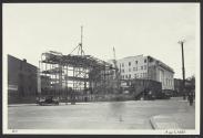Construction of the Eastman Theatre with Eastman School of Music behind it