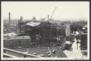 Eastman Theatre construction site with Eastman School of Music behind it