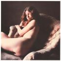 [Nude woman on chair]