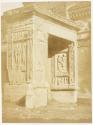 [Ancient sculpted stone archway]