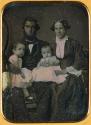 [Man and woman with two infants]