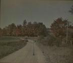 [Dirt road]