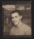 [Photo booth portrait of young man]
