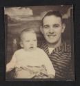 [Photo booth portrait of a man and child]